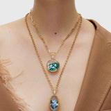 Oval Medallion Necklace with Blue Crystals  ( with Claw detail)